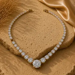 Broken diamond necklace featuring a missing stone and damaged setting before professional necklace repair and stone replacement by Portier Jewelers.
