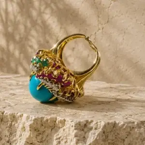 damaged gold ring with broken shank and multi-stone setting requiring repair and stone replacement